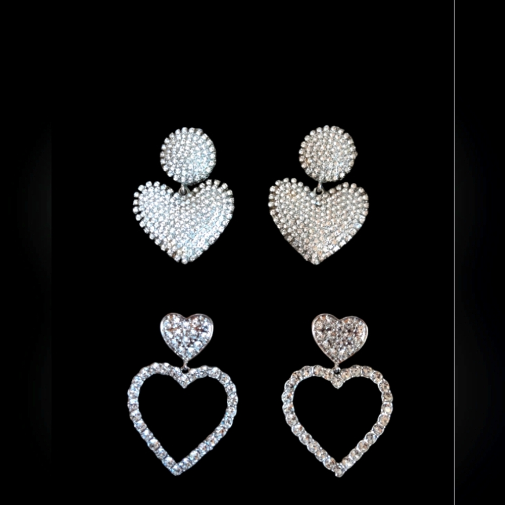 Two sets of heart earrings